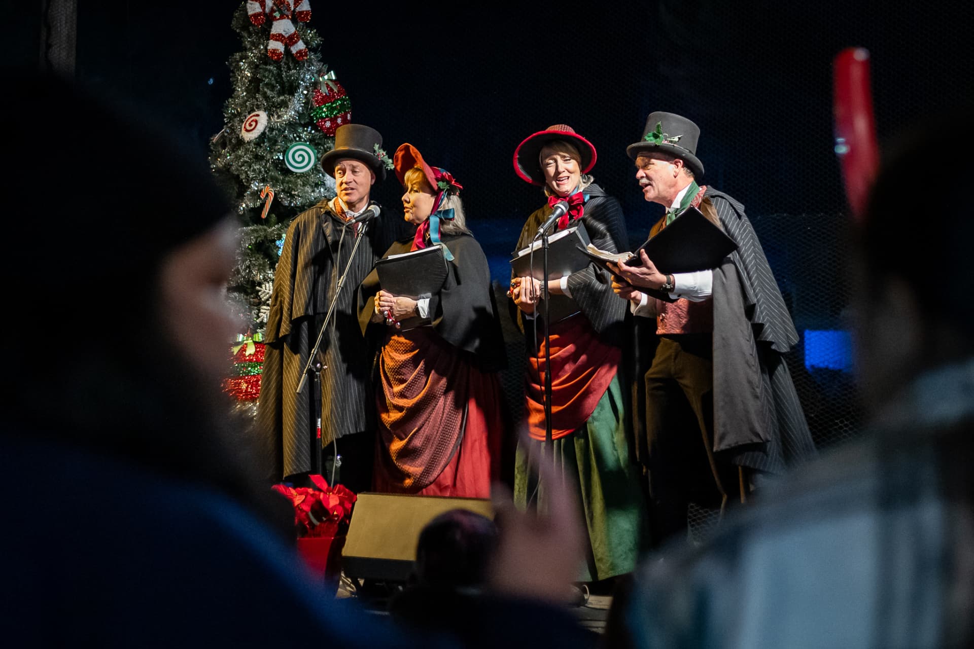Carolers singing on stage at SnowSide