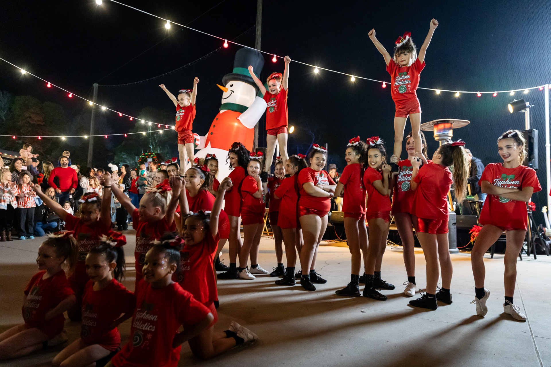 Youth cheer team performing for the crowd at SnowSide