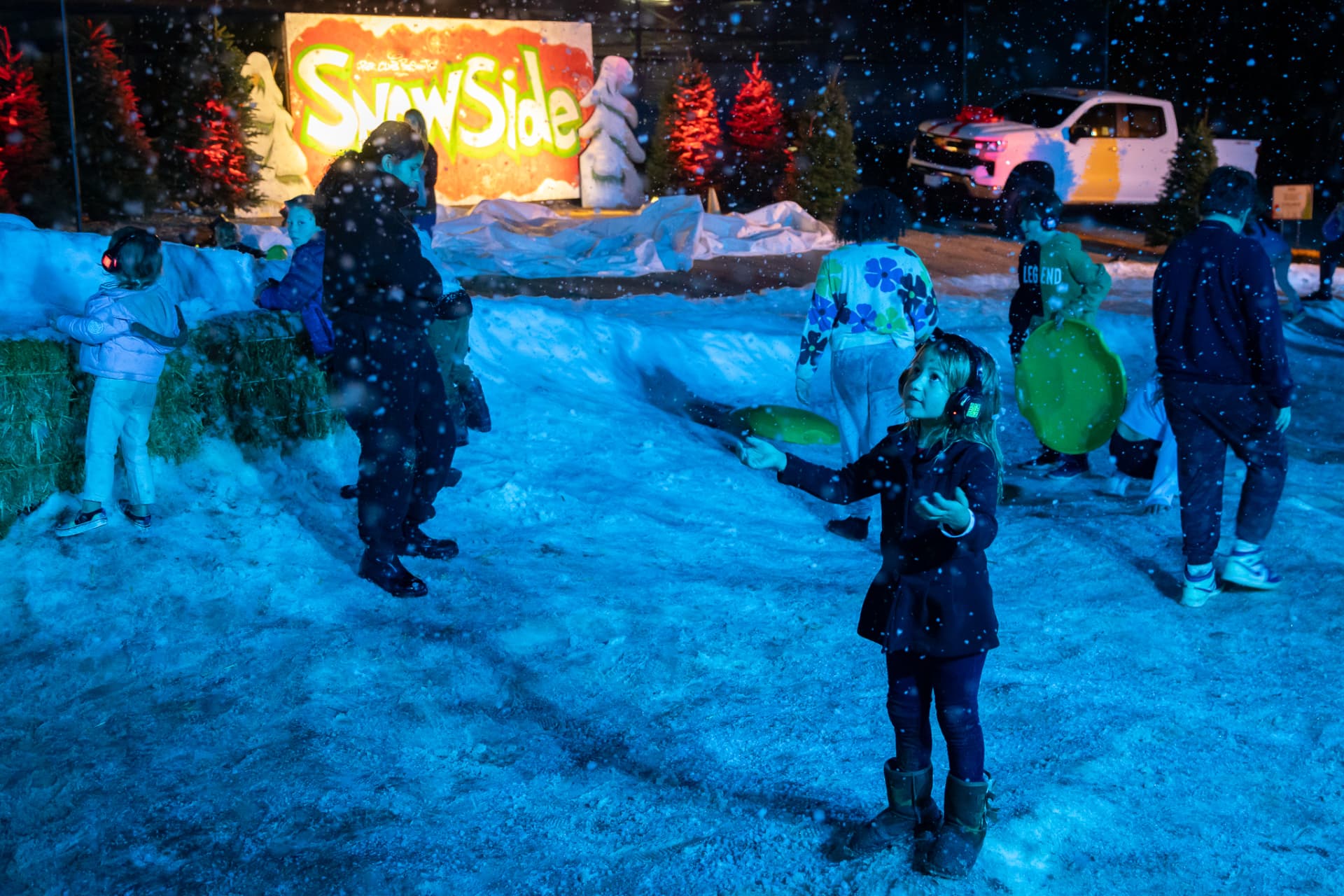 Child in headphones at the SnowSide silent disco snowfall